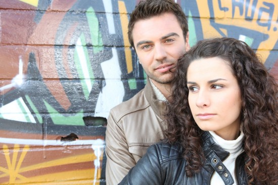 Couple in front of a Graffiti wall